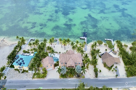 Pieces of eight, cayman kai w/200 ft of beachfront and 3 docks