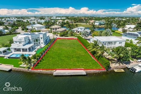 Stunning canal-front land lot with approved plans, grand harbour