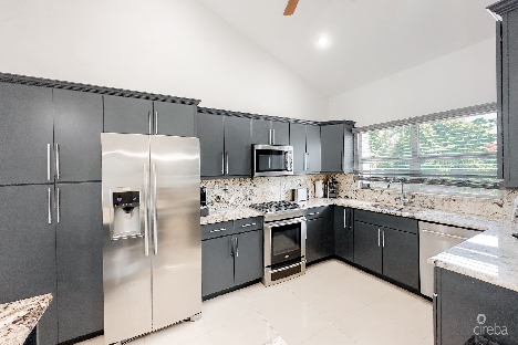 Bimini drive canal front family home, grand harbour