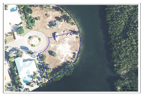 The island 0.39 acres, canal front