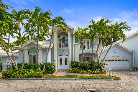 Britannia king’s court villa 1004 | garages | with dock