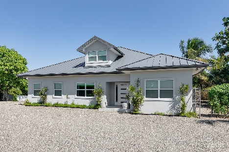 Elevated, 6-bedroom  single family home on a massive parcel