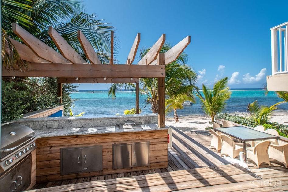 Caribbean paradise  rare beach front villa