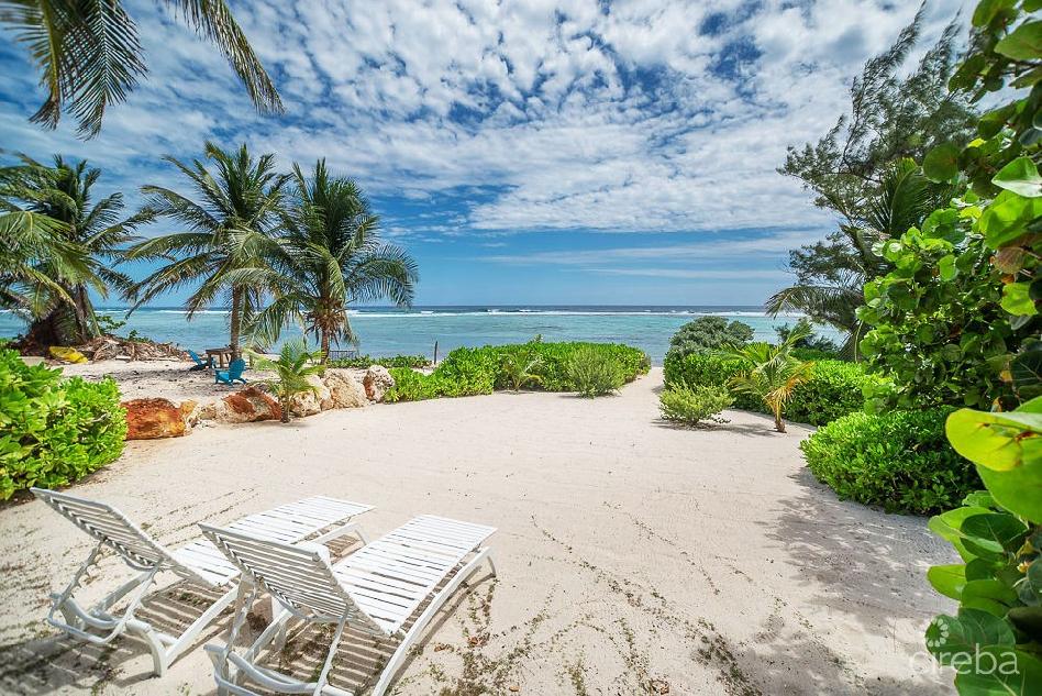 Luna sea – beachfront  home & cottage – price reduced