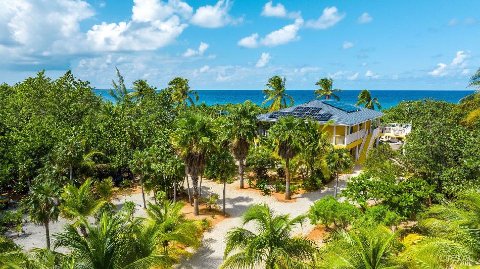 Tropical runaway – cayman brac beachfront