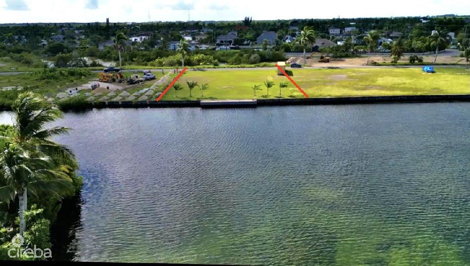 Royal palms dr lagoon front lot w/50 foot dock