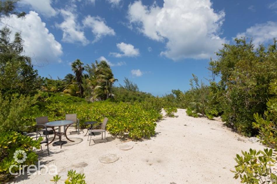 Cayman kai ocean front lot on little sound with special offer of optional foundation company