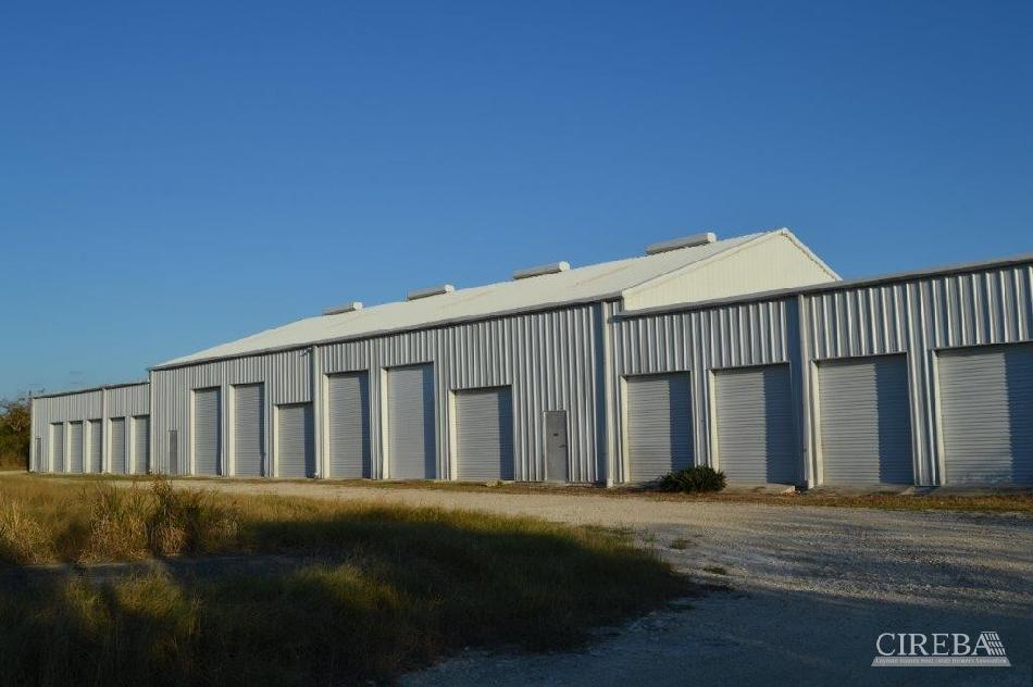 Little cayman warehouse (20 units) and land sub-division  13 lots