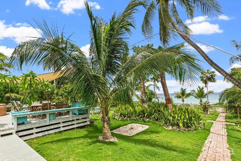 Oceanfront home with expansive grounds, pool and pickleball court