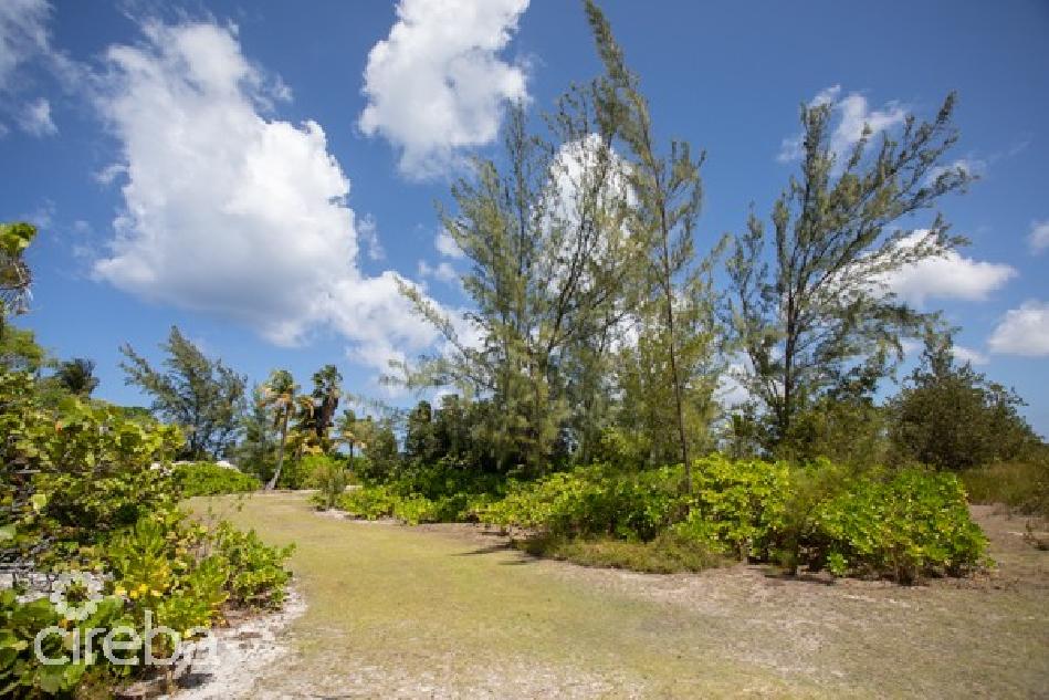 Large cayman kai oceanfront lot on little sound with water connection