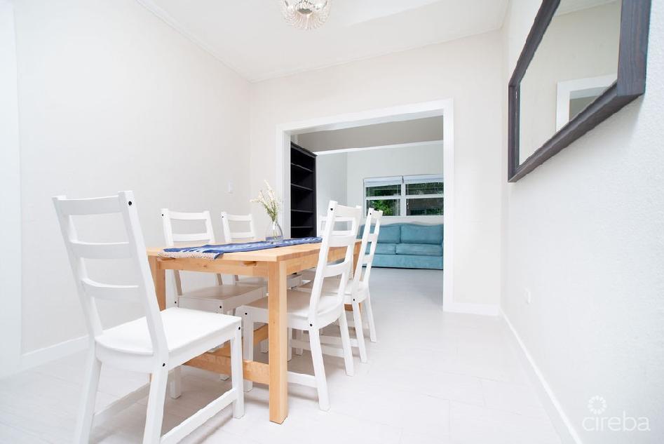 Beautifully renovated 3bed home with den + income producing 1 bed apartment