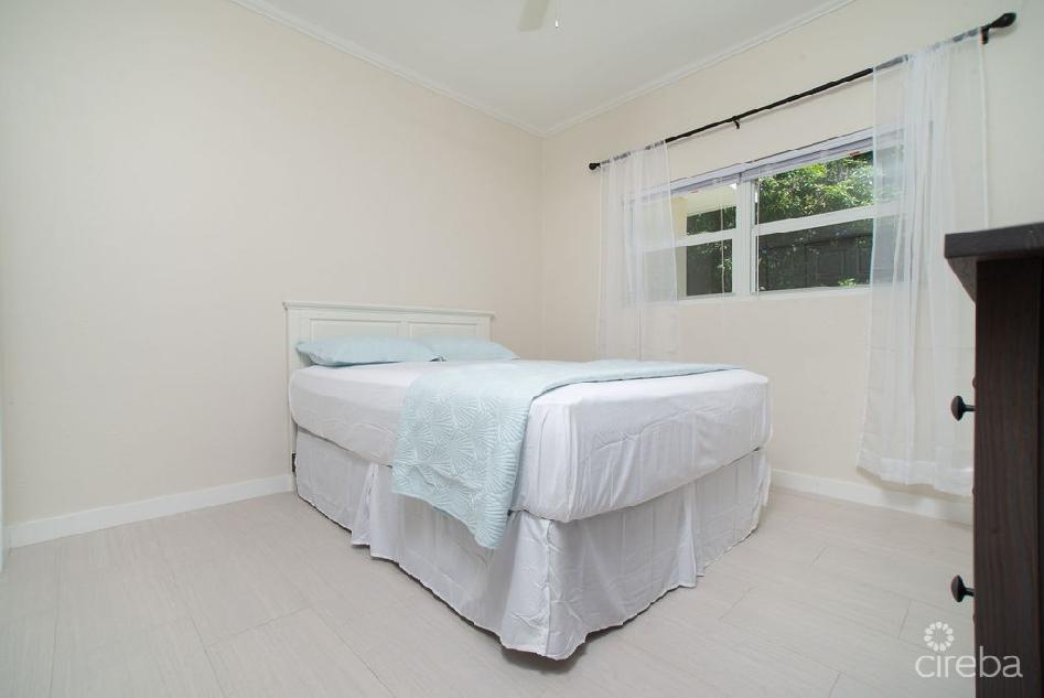 Beautifully renovated 3bed home with den + income producing 1 bed apartment
