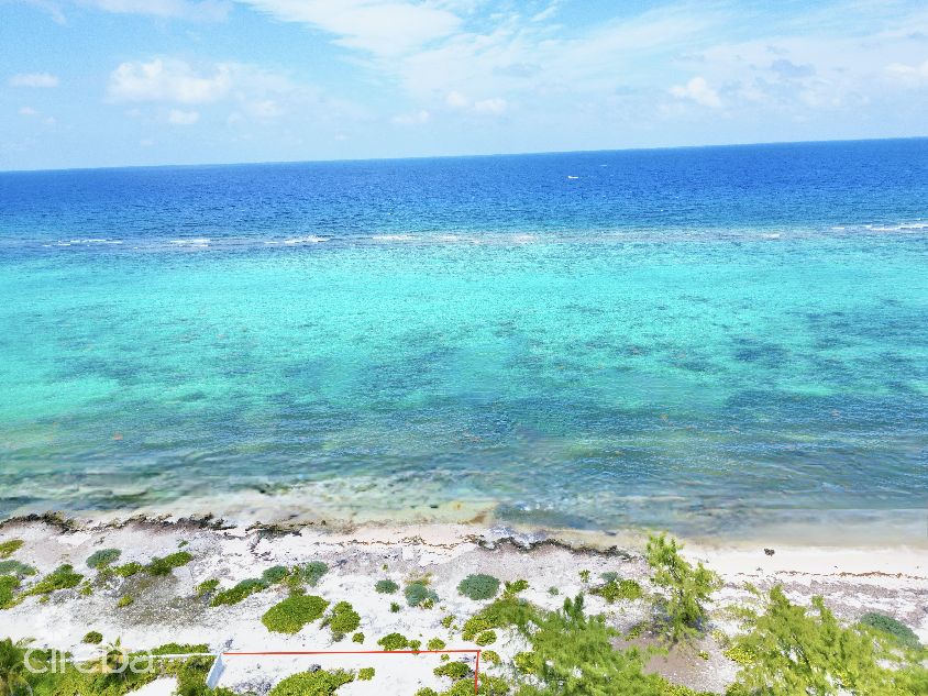 Rum point beachfront lot w/coral reef steps away