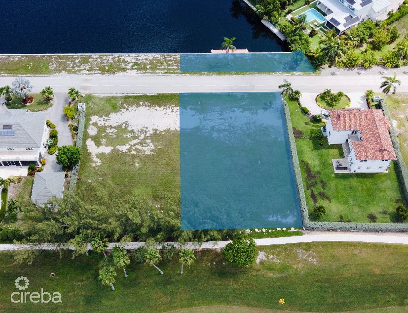 Crystal harbour canal front golf view lot with dock